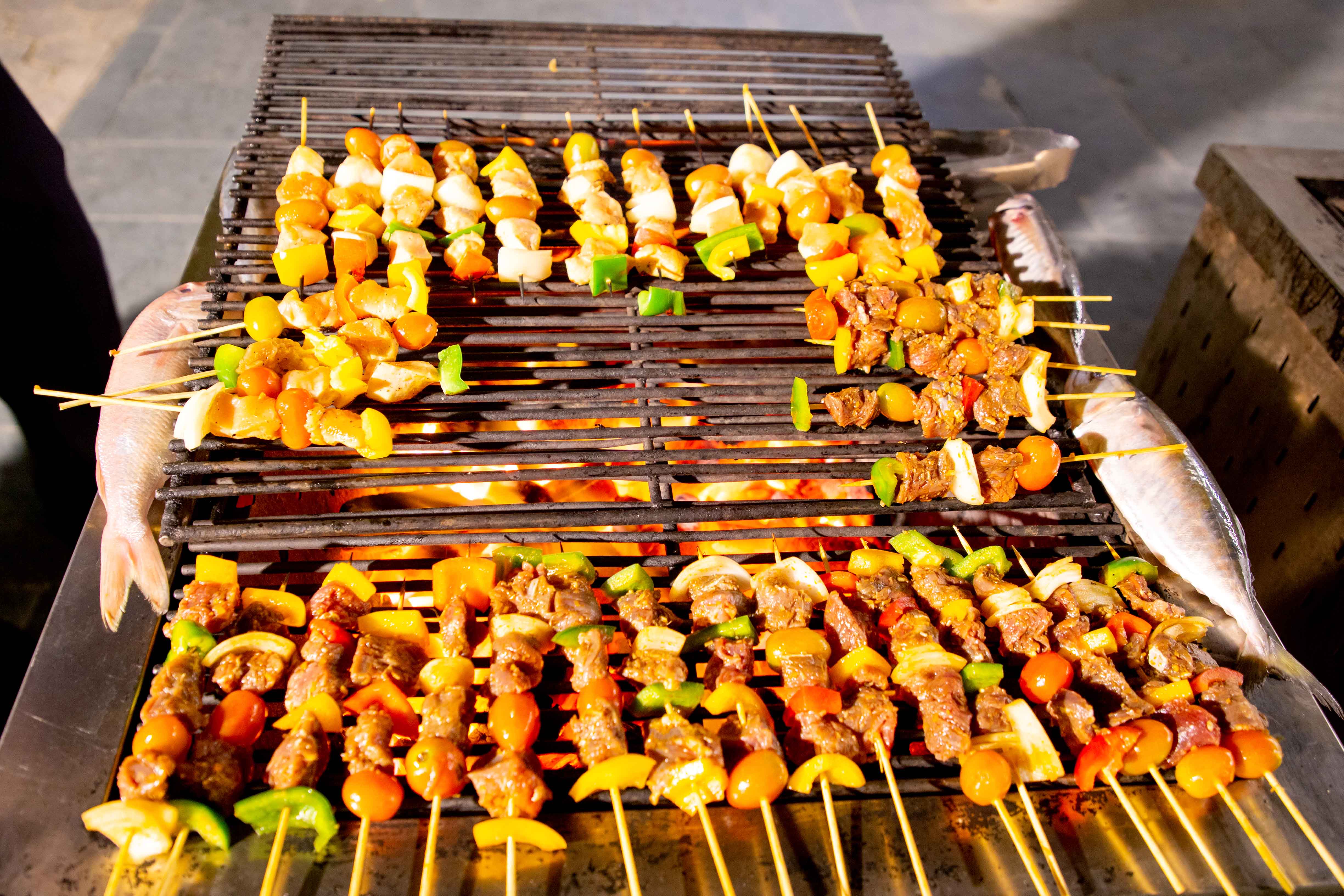 Chef presenting signature creation with artistic precision